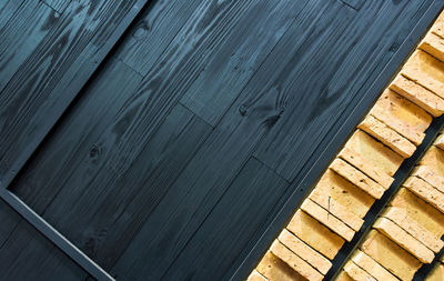 High angle view of wood on floor against wall