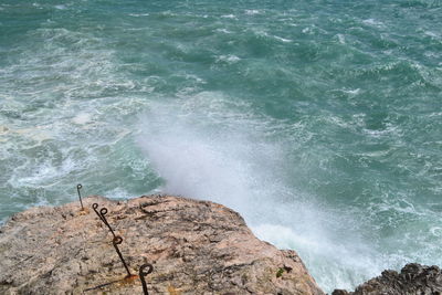 Scenic view of rocks in sea