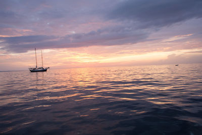 Scenic view of sea at sunset