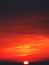 Scenic view of dramatic sky during sunset