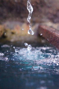 Close-up of water splashing surface