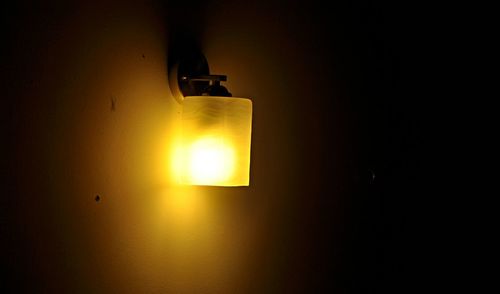 Illuminated lamp in dark room