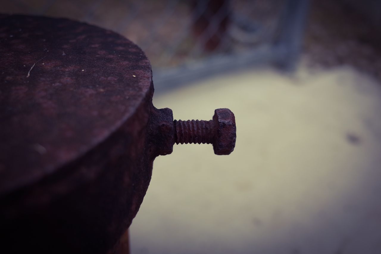 sky, focus on foreground, close-up, metal, built structure, cloud - sky, low angle view, architecture, building exterior, photography themes, technology, old, dusk, selective focus, camera - photographic equipment, outdoors, protection, tower, photographing, no people