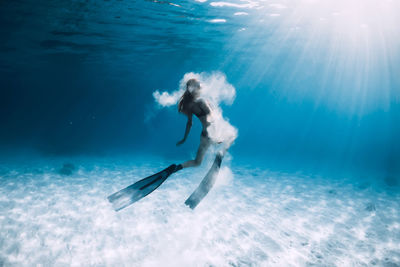 Man swimming in sea