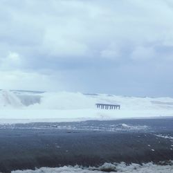 Scenic view of sea against sky during winter