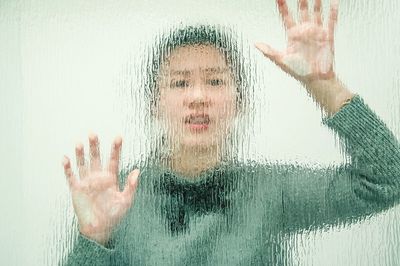 Close-up of person hand against blurred background