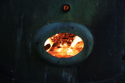 High angle view of fire in barbecue grill