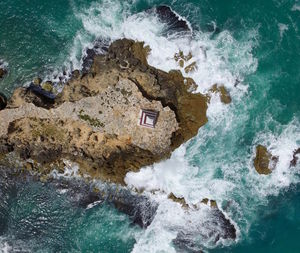 High angle view of waves in sea
