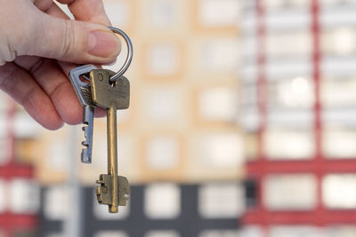 Close-up of hand holding keys