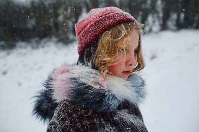 Close-up of girl in snow