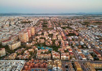 High angle shot of townscape against sky