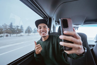 Young woman using mobile phone