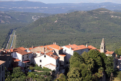 High angle view of townscape against mountains