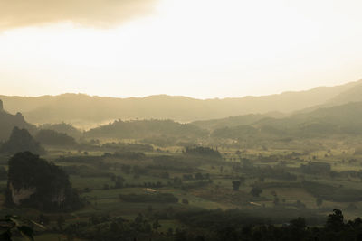 Scenic view of landscape against sky during sunset