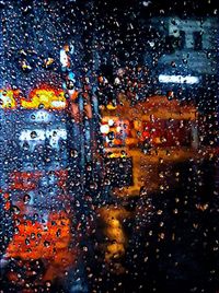 Full frame shot of raindrops on window