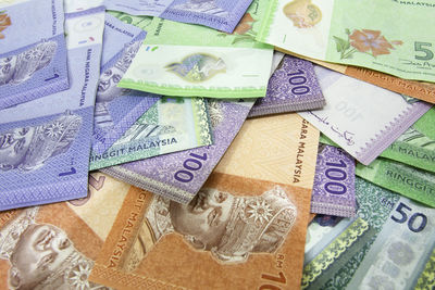 High angle view of paper currency on table