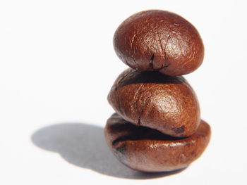 Close-up of bread against white background