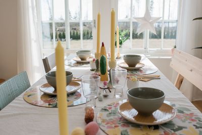 Dinner table at home decorated for easter party