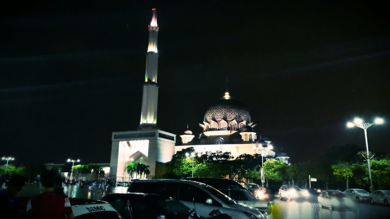 illuminated, night, religion, architecture, built structure, place of worship, building exterior, spirituality, lighting equipment, dome, street light, church, travel destinations, famous place, travel, city, sky, low angle view