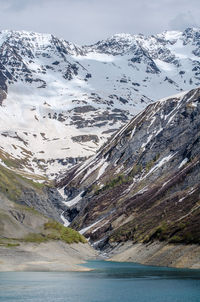 Scenic view of snowcapped mountains during winter