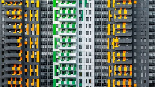 Full frame shot of yellow office building