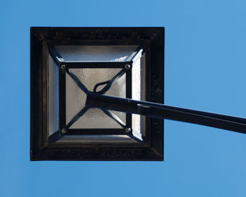 Low angle view of building against clear blue sky