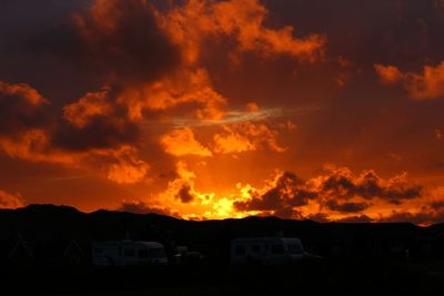 Scenic view of dramatic sky during sunset