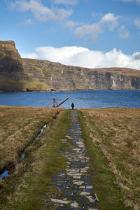 Scenic view of land against sky