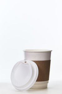 Close-up of coffee cup on white background