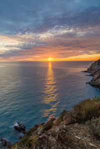 Scenic view of sea against sky during sunset