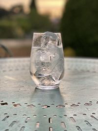 Close-up of water on glass table