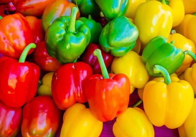 Colorful bell peppers, green yellow and orange are delicious and attractive peppers.