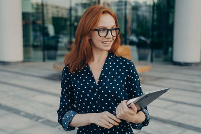 Young woman using mobile phone