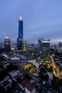 High angle view of city at sunset