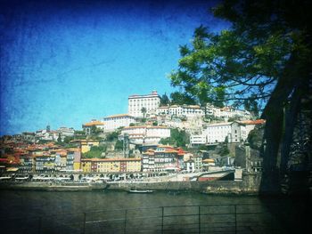 Buildings in city against sky