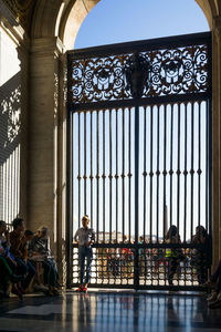 People sitting outside building