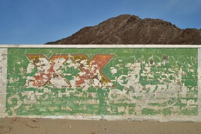 Close-up of graffiti on wall