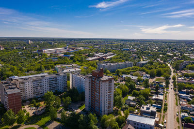 High angle view of buildings in city against sky