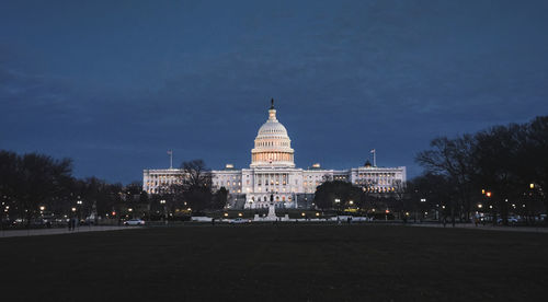 Capitol building lit up at dusk