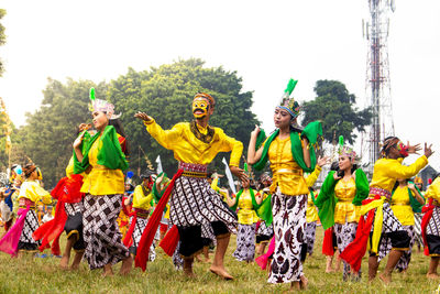 Group of people dancing on stage