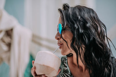 Portrait of woman holding ice cream