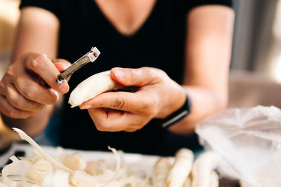 Close-up of person preparing food