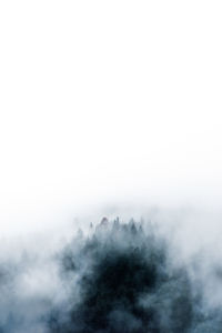 Scenic view of fog against sky