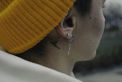 Close-up of woman wearing hat