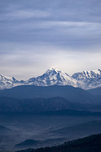 Himalayan peaks covered in snow, a view from kausani, switzerland of india.