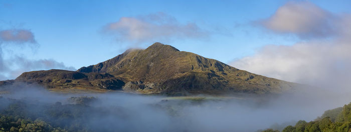 Panoramic view of volcanic mountain against sky