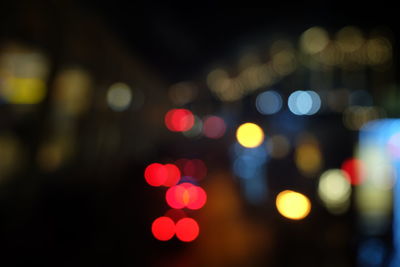 Defocused image of illuminated lights at night