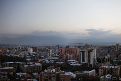 High angle view of townscape against sky during sunset