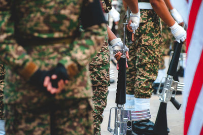 Army soldiers with rifle during parade