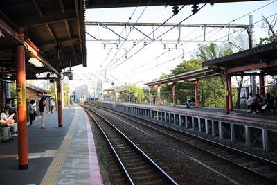 Railroad station platform against sky